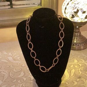 Gold oval link necklace.